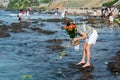 Candomble people are seen throwing flowers into the sea in honor of Iemanja