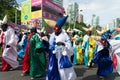 Salvador, Bahia, Brazil - February 11, 2023: Group of masked and costumed people parade in Fuzue, pre-carnival in Salvador, Bahia