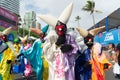 Salvador, Bahia, Brazil - February 11, 2023: Group of masked and costumed people parade in Fuzue, pre-carnival in Salvador, Bahia