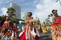 Salvador, Bahia, Brazil - February 11, 2023: Members of a traditional afro group dressed in costume parade in Fuzue, pre-carnival