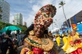 Salvador, Bahia, Brazil - February 11, 2023: Members of a traditional afro group dressed in costume parade in Fuzue, pre-carnival