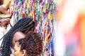 Faithful pray in front of the grid of the church of Senhor do Bonfim on the traditional first Friday of 2023