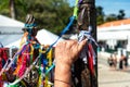 Faithful pray in front of the grid of the church of Senhor do Bonfim on the traditional first Friday of 2023