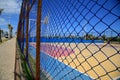 Protective fence on sports court Royalty Free Stock Photo