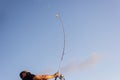 Fisherman in action with his pole in Ponta do Humaita