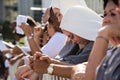 Nuns and Catholic faithful are praying during Corpus Christ mass