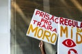 Brazilians protest with banners and posters with words against the government of President Jair Bolsonaro