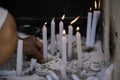 Salvador, Bahia, Brazil - November 02, 2015: People lighting candles in honor of the Day of the Dead Royalty Free Stock Photo