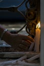 Salvador, Bahia, Brazil - November 02, 2015: People lighting candles in honor of the Day of the Dead Royalty Free Stock Photo