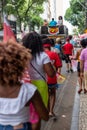 Demonstrators walk with posters, banners and flags during the Crespo Empowerment March in Salvador, Bahia