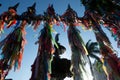 Close-up photo of souvenir ribbons tied to an iron railing in Largo Terreiro de Jesus, Pelourinho, historic center of the city of