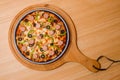 Salvador mozzarella Pizza served in wooden cutting board isolated on table top view of italian fastfood Royalty Free Stock Photo