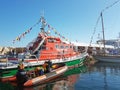 Salvage ship moored near the pier in a marina of the French maritime city. Boat show in Ciotat.Clear sunny day. Europe. Mediterran Royalty Free Stock Photo