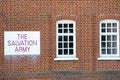 Salvation Army sign with red brickwork Royalty Free Stock Photo