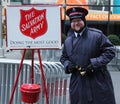 Salvation Army soldier perform for collections in midtown Manhattan Royalty Free Stock Photo