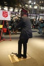 Salvation Army soldier performs for collections in midtown Manhattan. Royalty Free Stock Photo