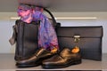 Salvatore Ferragamo for Men, Handmade Leather Shoes and Bags, Purple and Pink Scarf Royalty Free Stock Photo