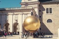 Salzburg, Austria - April 2015: Cathedral and Monument to the confectioner Paul Fuerst. Royalty Free Stock Photo