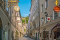 Salzburg, Austria - August 13, 2018: Getreidegasse street - famous shopping street in Salzburg