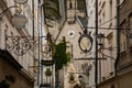 Salzburg, Austria, 28 August 2021: Grain Lane or Getreidegasse famous shopping narrow street in historic Altstadt or Old Town,