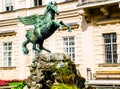 Salzburg/ Austria August 28th 2019: Bronze statue of a riding winged horse near MIRABELL Palace in Salzburg, Austria