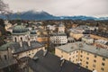 Salzburg Austria European medieval city street from above in December winter time with cathedral and living buildings foreground Royalty Free Stock Photo