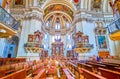 The rows of benches in Salzburg Cathedral, Austria Royalty Free Stock Photo