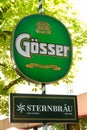 SALZBURG, AUSTRIA - June 03, 2019: Label of beer brewery GÃÂ¶sser on a typical beer garden