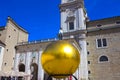 Salzburg, Austria - May 01, 2017: The golden ball statue with a man on the top sculpture, Kapitelplatz Square, Salzburg,