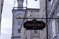 Famous historical street Getreidegasse with multiple advertising signs. Salzburg old town was listed as a UNESCO World Heritage Royalty Free Stock Photo