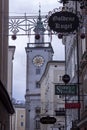 Famous historical street Getreidegasse with multiple advertising signs. Salzburg old town was listed as a UNESCO World Heritage Royalty Free Stock Photo