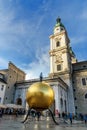 Sculpture Sphaera on Kapitelplatz square in historic Altstadt or Old Town of Salzburg. Austria Royalty Free Stock Photo