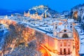 Salzburg, Austria: Winter viewof the historic city of Salzburg with famous Festung Hohensalzburg and Salzach river Royalty Free Stock Photo