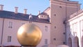 Salzburg Balkenhol Sphaera golden globe art piece at Kapitelplatz