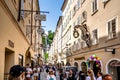 View of the Getreidegasse, in bustling heart of Salzburg\'s Old Town. Charming street lined with shops and cafes.