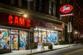 Sam\'s Outdoor Outfitters at night, on Main Street in Brattleboro, Vermont