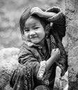 Samagau, Gorkha - December 23 2018: Young beautiful sherpa girl poses infront of the camera Royalty Free Stock Photo