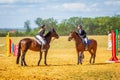 Samara, August 2018: Equestrian sport dressage, walkthrough - two young girls in jockey clothes are sitting on a horse Royalty Free Stock Photo