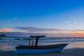 Samara, Costa Rica, June, 26, 2018: Beautiful outdoor view of of boat in the sand in a gorgeous sunset view in the beach Royalty Free Stock Photo