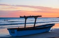 Samara, Costa Rica, June, 26, 2018: Beautiful outdoor view of of boat in the sand in a gorgeous sunset view in the beach Royalty Free Stock Photo