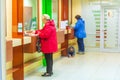 Samara, November 2018: Customer service in the Sberbank branch. Text in Russian: window