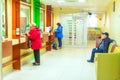 Samara, November 2018: Customer service in the Sberbank branch. Text in Russian: window