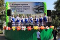 Samara, Russia - August 24, 2014: Russian folk good Unknown people sing a song on stage.