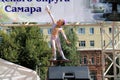 Samara, Russia - August 24, 2014: an unknown girl gymnast performs on stage