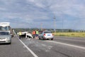 Upside down car after a head-on collision. Police regulates the movement and prepares documents Royalty Free Stock Photo