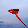Flying red kite sky background Royalty Free Stock Photo