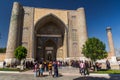 SAMARKAND, UZBEKISTAN: APRIL 27, 2018: Local tourists in front of Bibi-Khanym Mosque in Samarkand, Uzbekist