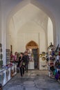 SAMARKAND, UZBEKISTAN: APRIL 28, 2018: Souvenir stalls at the courtyard of Sher Dor Madrasa in Samarkand, Uzbekist