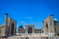 Panoramic View to the Registan square and its three madrasahs: Ulugh Beg Madrasah, Tilya-Kori Madrasah and Sher-Dor Madrasah Royalty Free Stock Photo