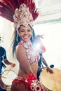 Samba, music and dance with woman at carnival with drums for celebration, party and festival in Rio de Janeiro. Summer Royalty Free Stock Photo